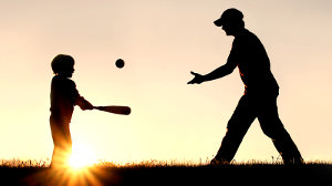father son playing baseball because of parenting plans